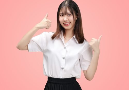 Portrait,Asian,Student,Girl,With,Thai,University,Uniform,Thumbs,Up